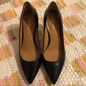 Black Calvin Klein pumps